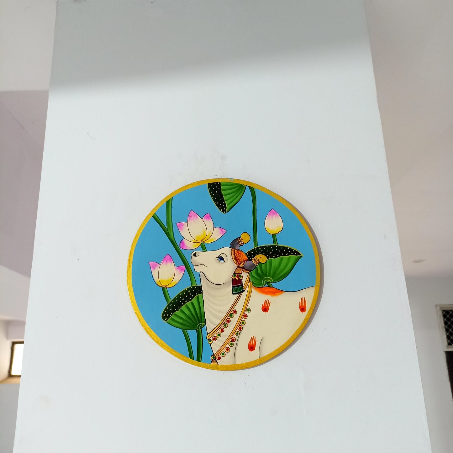 Hand-Painted Wooden Wall Plate – Kamdhenu Cow with Lotus Motif (10 Inch)