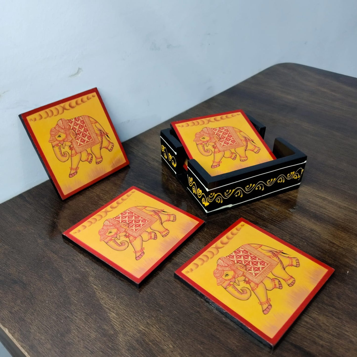 Handcrafted Wooden Coaster Set – Traditional Rajasthani Elephant Art (Set of 6 with Holder)