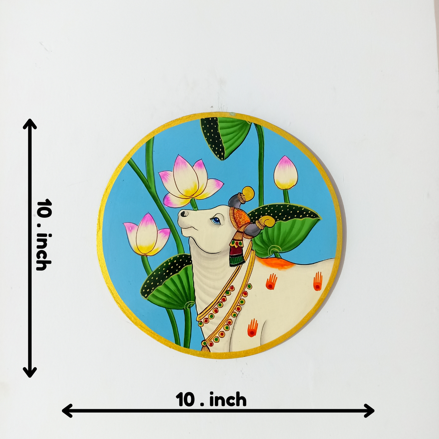 Hand-Painted Wooden Wall Plate – Kamdhenu Cow with Lotus Motif (10 Inch)