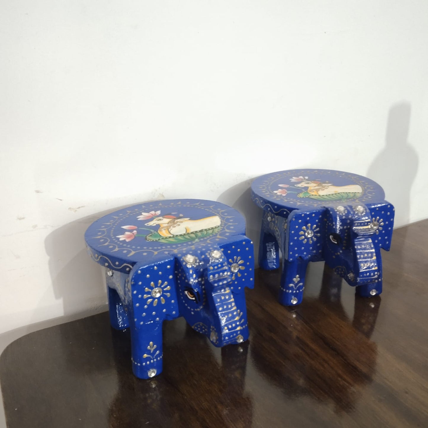 Hand-Painted Wooden Elephant Stool – Blue Nandi Cow Design (Set of 2)