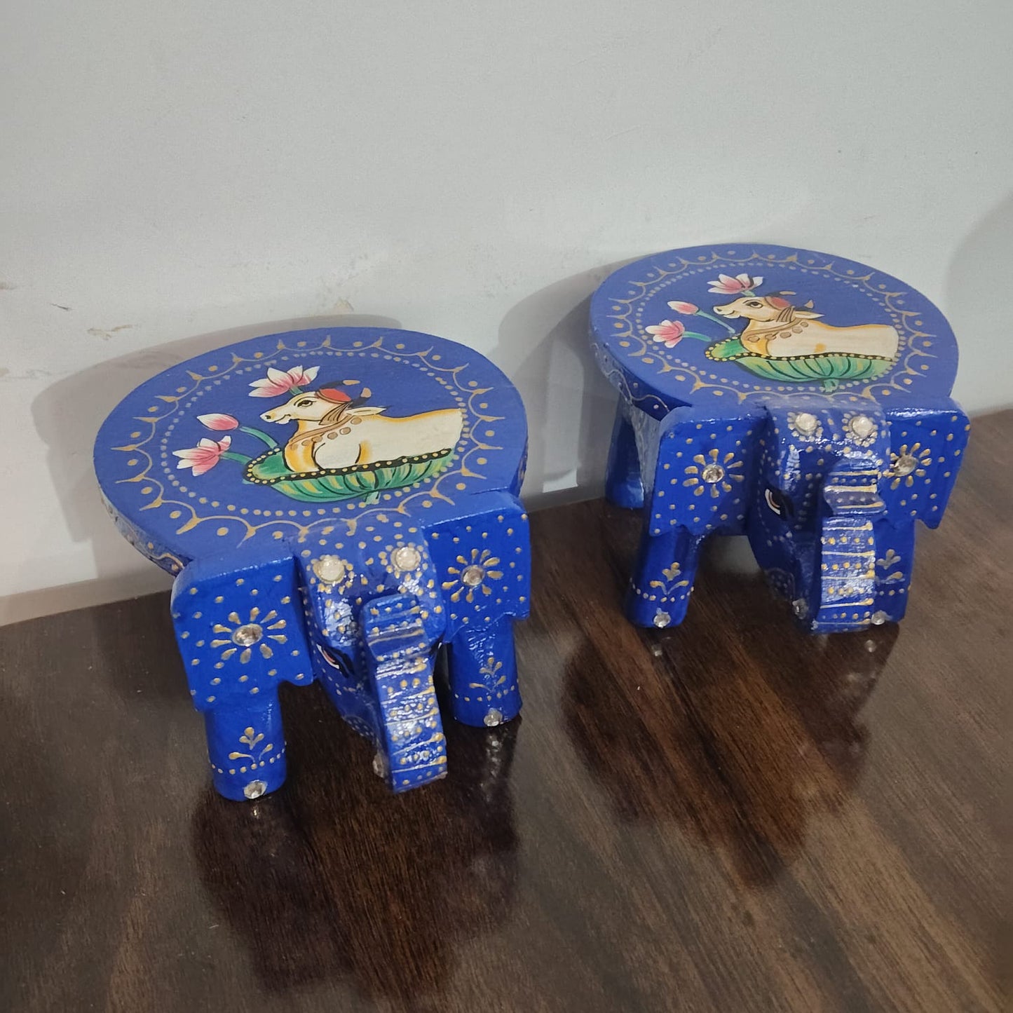 Hand-Painted Wooden Elephant Stool – Blue Nandi Cow Design (Set of 2)